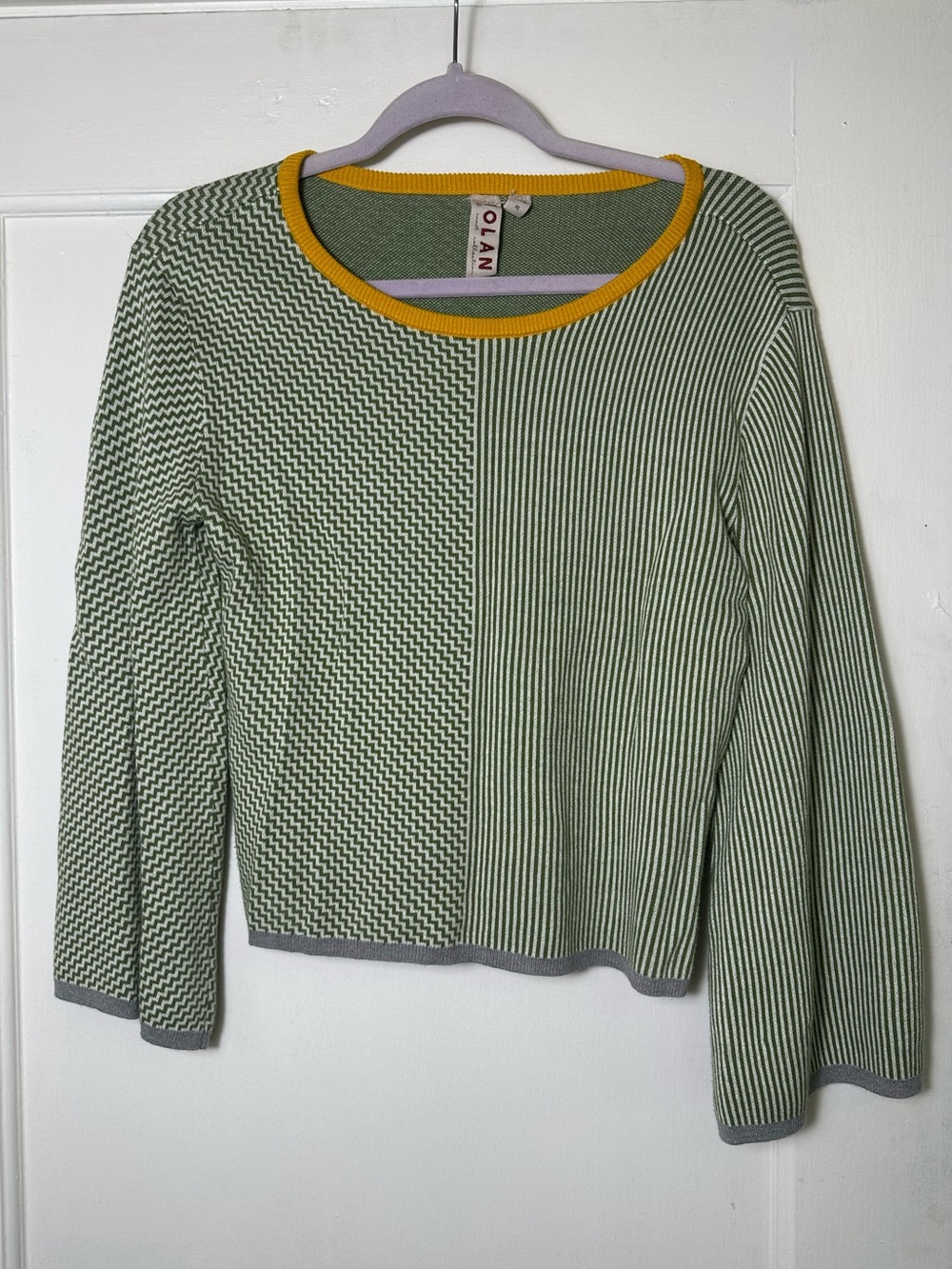 Sweater with mismatched sides